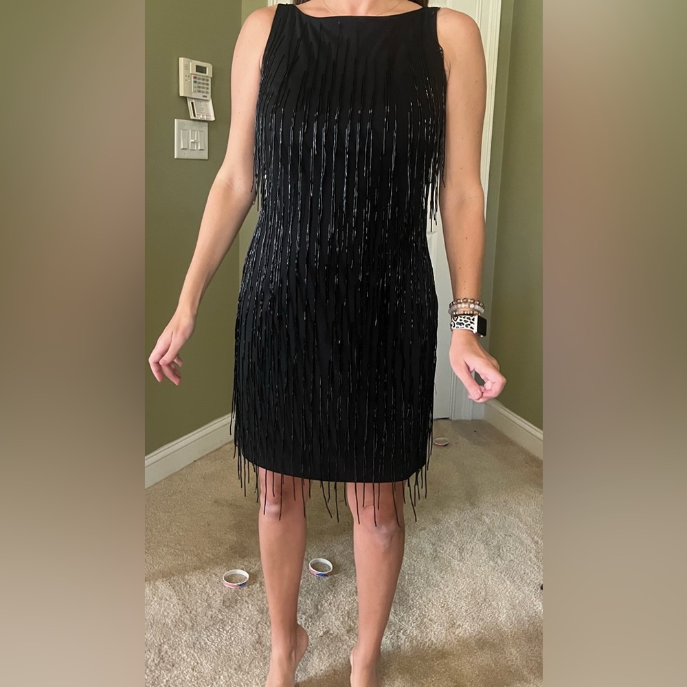 Beaded shimmery dress. Can be worn for formal occasions or for a fun date